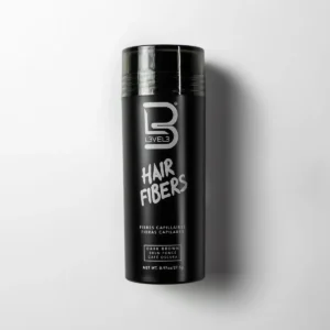 L3VEL3 Hair Fibers bottle for concealing thinning hair and bald spots with natural-looking fuller hair coverage in black and dark brown shades.